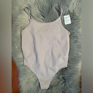 NWT Lululemon Underneath It All Bodysuit Smoky Blush Pink Ribbed Women SZ L